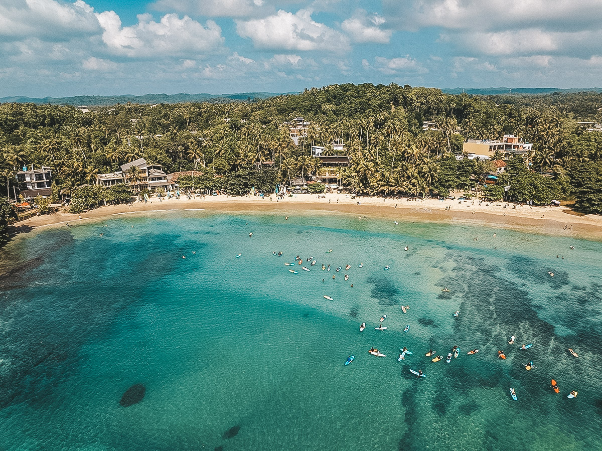 Hiriketiya Beach bay in Sri Lanka, calm surf and curved shoreline